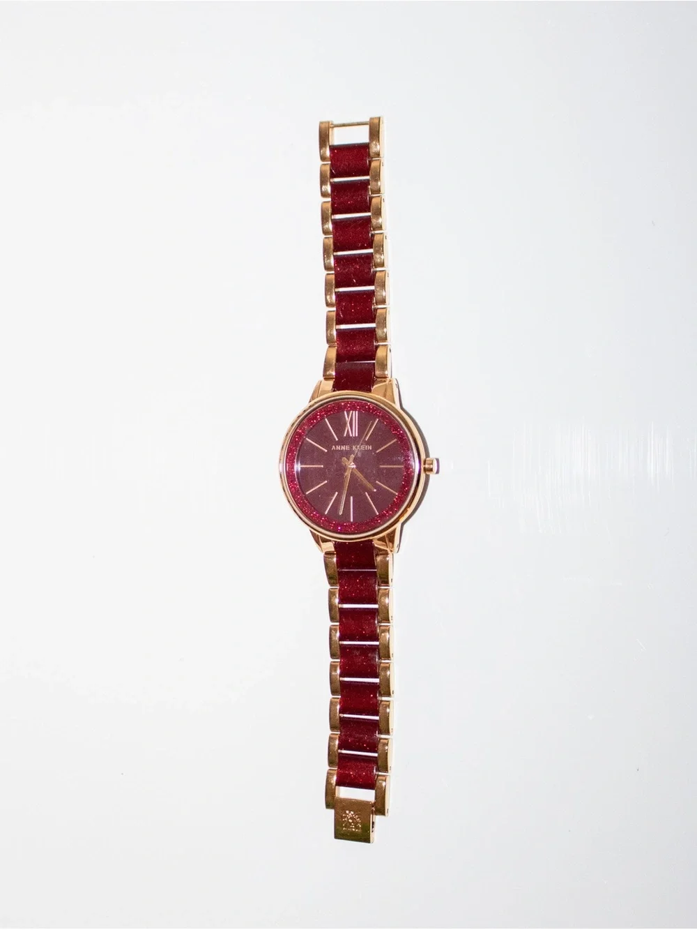 Anne Klein AK/1412 Burgundy Glitter Gold-Tone Bracelet Watch